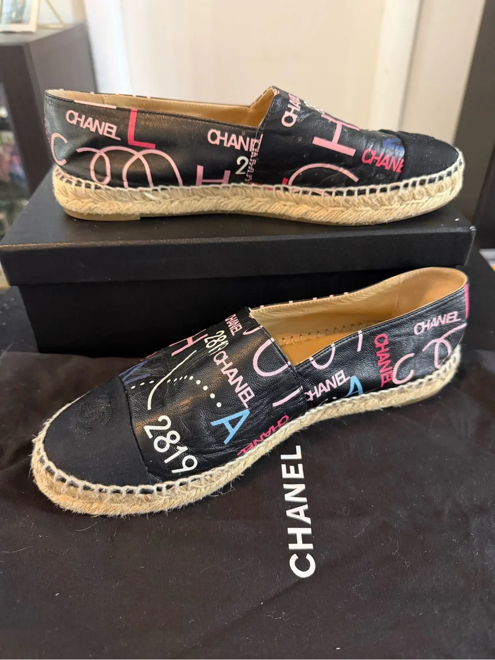 Authentic CHANEL Black Canvas Espadrilles with Pink & Blue Logo Print